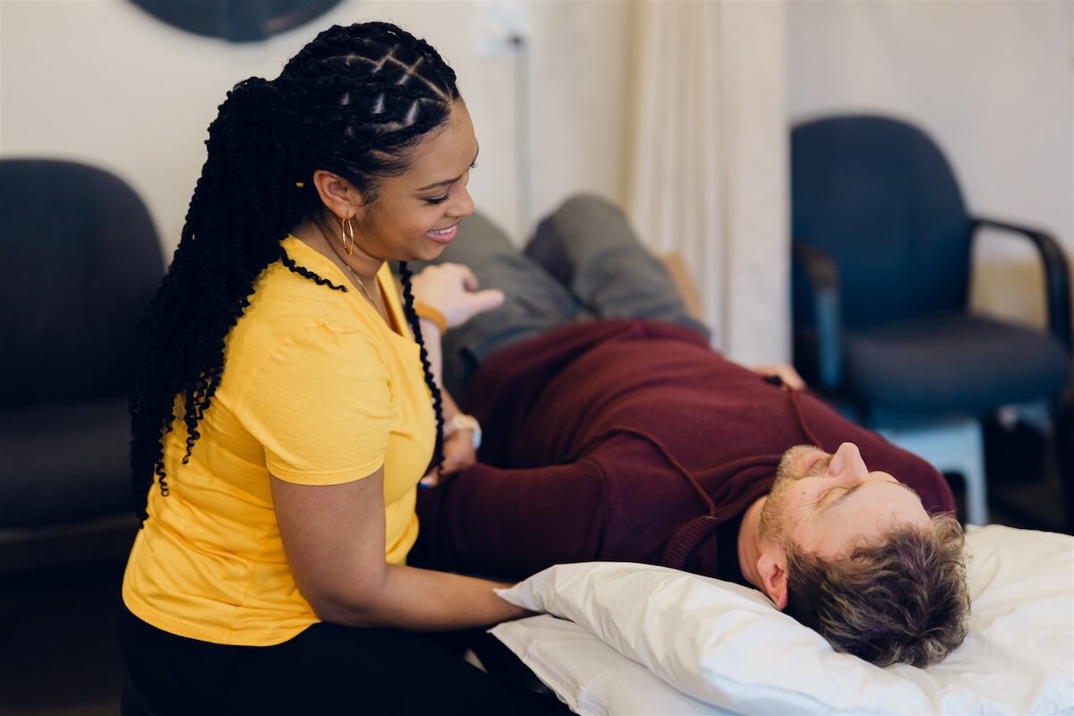 Patient being treated by a practitioner at our Osoyoos clinic